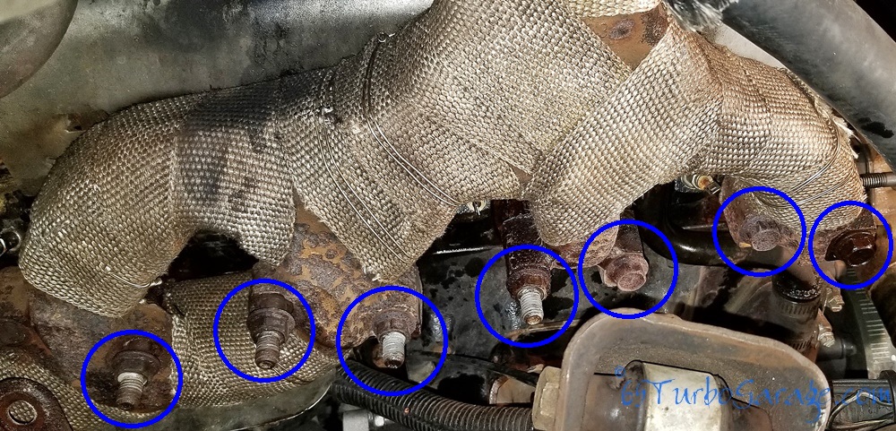 Remove the exhaust manifold bolts