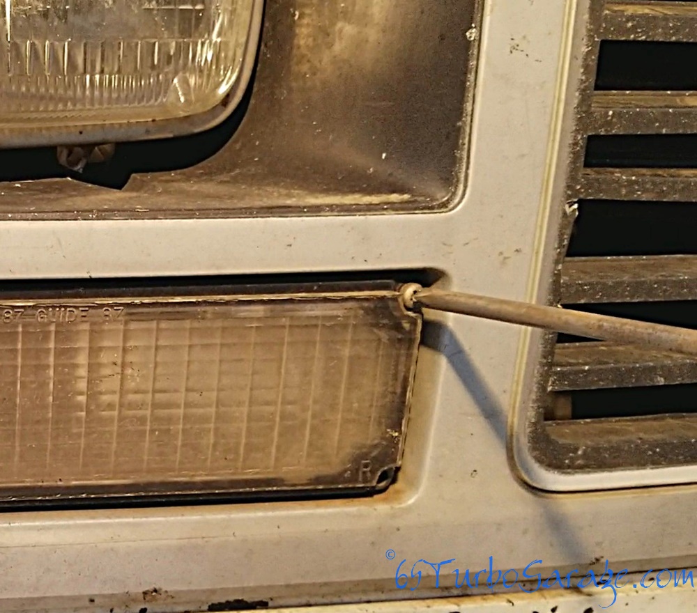 Remove front blinker screws